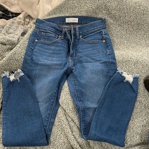 Loft skinny jeans with distressed hem (size 0)